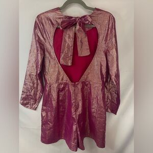asos fuchsia romper with an open back. So shiny and festive! This is lined.